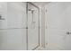 Clean bathroom with a shower stall and a door at 16518 Sea Glass St, Winter Garden, FL 34787