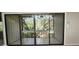 Private balcony with tiled flooring and lush, natural views at 203 Crown Oaks Way # 202, Longwood, FL 32779