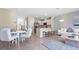 Open concept dining area with seating for four at 2183 Longleaf Rd, Davenport, FL 33837