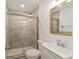 Updated bathroom features a glass-enclosed shower and a modern vanity at 2311 Sw 3Rd St, Ocala, FL 34471