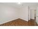 Cozy bedroom with wood-look floors and a neutral color scheme at 2311 Sw 3Rd St, Ocala, FL 34471