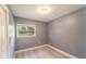 This bedroom features wood-look floors and neutral paint at 2311 Sw 3Rd St, Ocala, FL 34471