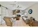 Spacious living room features a fireplace, built-in shelves, and ample seating at 2537 Lanier Rd, Kissimmee, FL 34744