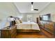 This main bedroom features wood floors, large window, and a neutral color scheme at 2537 Lanier Rd, Kissimmee, FL 34744