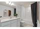 Clean bathroom, featuring a white subway tile shower and modern vanity at 2575 Winsome Way, Davenport, FL 33896