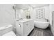 Elegant bathroom with double vanity, soaking tub, and marble tile at 317 Hermits Trl, Altamonte Springs, FL 32701