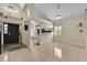 Bright dining area with a table for six and an open view of the kitchen at 377 River Chase Dr, Orlando, FL 32807