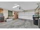 Attached garage with washer, dryer, and ample storage at 377 River Chase Dr, Orlando, FL 32807