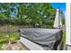 Relaxing hot tub with cover, surrounded by greenery at 377 River Chase Dr, Orlando, FL 32807