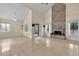 Spacious living room featuring a brick fireplace and vaulted ceiling at 377 River Chase Dr, Orlando, FL 32807