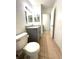 Bathroom with granite countertop and gray vanity at 4524 Commander Dr # 1613, Orlando, FL 32822