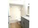 Bathroom with shower/tub combo and gray vanity at 4524 Commander Dr # 1613, Orlando, FL 32822