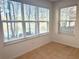 Spacious dining area with large windows and view at 4524 Commander Dr # 1613, Orlando, FL 32822