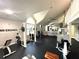 Modern gym with weight machines and inspirational quote at 4524 Commander Dr # 1613, Orlando, FL 32822