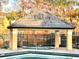 Relaxing hot tub with covered seating area at 4524 Commander Dr # 1613, Orlando, FL 32822