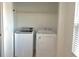 Bright laundry room with washer and dryer included at 4524 Commander Dr # 1613, Orlando, FL 32822