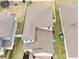 Aerial view of a two-story house with gray roof shingles at 494 Amadoras Way, St Cloud, FL 34771