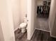Small bathroom with toilet and access to a large closet at 494 Amadoras Way, St Cloud, FL 34771