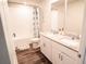 Bathroom boasts double vanity, bathtub, and tile flooring at 494 Amadoras Way, St Cloud, FL 34771