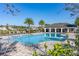 Relaxing community pool with a shaded seating area at 494 Amadoras Way, St Cloud, FL 34771