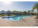 Inviting community pool with plenty of lounge chairs at 494 Amadoras Way, St Cloud, FL 34771