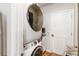 Efficient laundry area features a stackable washer and dryer set with a built-in storage cabinet at 494 Amadoras Way, St Cloud, FL 34771