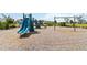 A fun playground features play structures, swings and wood chip ground, designed for safe and enjoyable outdoor play at 494 Amadoras Way, St Cloud, FL 34771