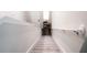 Carpeted staircase with simple, modern handrail at 494 Amadoras Way, St Cloud, FL 34771