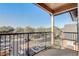 Balcony overlooking community parking and landscape at 5961 Westgate Dr # 2034, Orlando, FL 32835