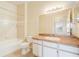 Clean bathroom with shower/tub combo, toilet and vanity at 5961 Westgate Dr # 2034, Orlando, FL 32835