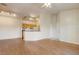Living room with hardwood floors, open kitchen, and high ceilings at 5961 Westgate Dr # 2034, Orlando, FL 32835