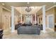 Elegant lobby with high ceilings, chandelier, and seating area at 5961 Westgate Dr # 2034, Orlando, FL 32835