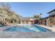 Inviting community pool area with plenty of lounge chairs at 5961 Westgate Dr # 2034, Orlando, FL 32835