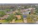 Aerial view of house and surrounding neighborhood at 615 Tuskawilla Point Ln, Winter Springs, FL 32708