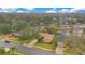 House nestled in a quiet neighborhood near a pond at 615 Tuskawilla Point Ln, Winter Springs, FL 32708