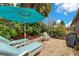 Relaxing backyard with patio furniture and grill at 615 Tuskawilla Point Ln, Winter Springs, FL 32708