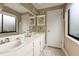Clean bathroom with double sinks and plenty of counter space at 615 Tuskawilla Point Ln, Winter Springs, FL 32708