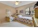 Guest bedroom with twin beds, ceiling fan, and ample closet space at 615 Tuskawilla Point Ln, Winter Springs, FL 32708
