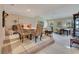 Open dining area with seating for six and access to living room at 615 Tuskawilla Point Ln, Winter Springs, FL 32708