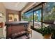 Relaxing screened-in hot tub with backyard access at 615 Tuskawilla Point Ln, Winter Springs, FL 32708