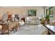 Spacious living room with comfy seating, large artwork, and natural light at 615 Tuskawilla Point Ln, Winter Springs, FL 32708