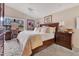 Spacious main bedroom with plush bedding and large windows at 615 Tuskawilla Point Ln, Winter Springs, FL 32708