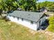 Aerial view of the back of the house showing the backyard and roof at 720 Jasmine Ave, Orange City, FL 32763