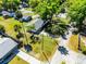 An overhead view of the house surrounded by green trees at 720 Jasmine Ave, Orange City, FL 32763