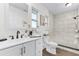 Bright bathroom with updated vanity, fixtures, shower stall, and natural lighting at 720 Jasmine Ave, Orange City, FL 32763