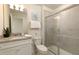 Bathroom with single vanity, shower/tub combo, and granite countertop at 7530 Oak Spring Ln, Davenport, FL 33837