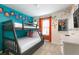 Bunk beds in a vibrant ' bedroom with colorful decor at 7530 Oak Spring Ln, Davenport, FL 33837