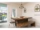Rustic dining area with farmhouse table at 7530 Oak Spring Ln, Davenport, FL 33837