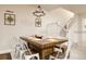Spacious dining area with wooden table and chairs at 7530 Oak Spring Ln, Davenport, FL 33837