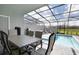 Relaxing pool area with patio furniture at 7530 Oak Spring Ln, Davenport, FL 33837